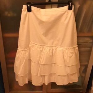 White ruffled skirt